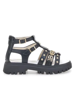 LAURA BIAGIOTTI Sandali neri con borchie oro con sottopiede in pelle 96219486